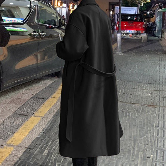 Longline belted overcoat with notched lapels and side pockets