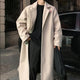 Longline belted overcoat with notched lapels and side pockets