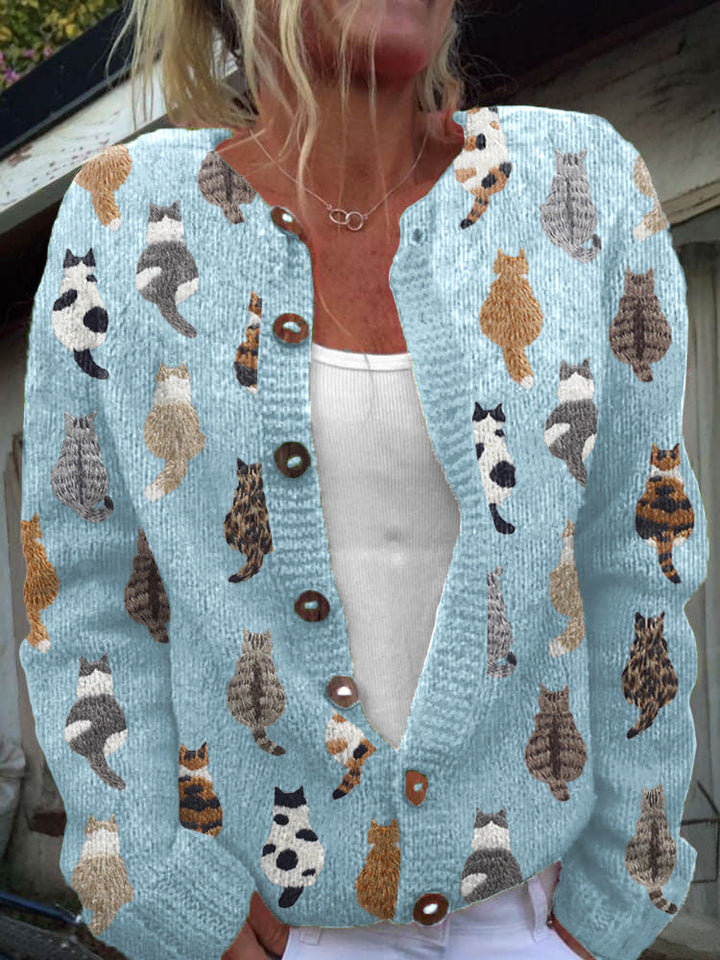 Women's button-front cardigan with repeating cat print and long sleeves