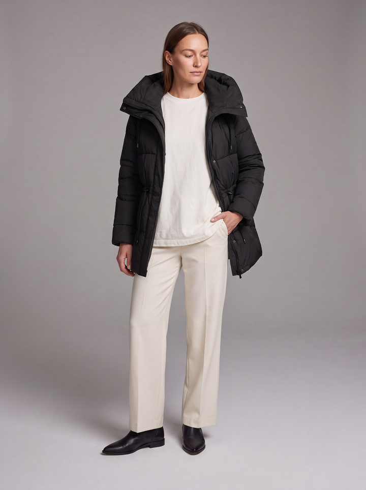 Women's padded hooded parka coat shown in beige and black