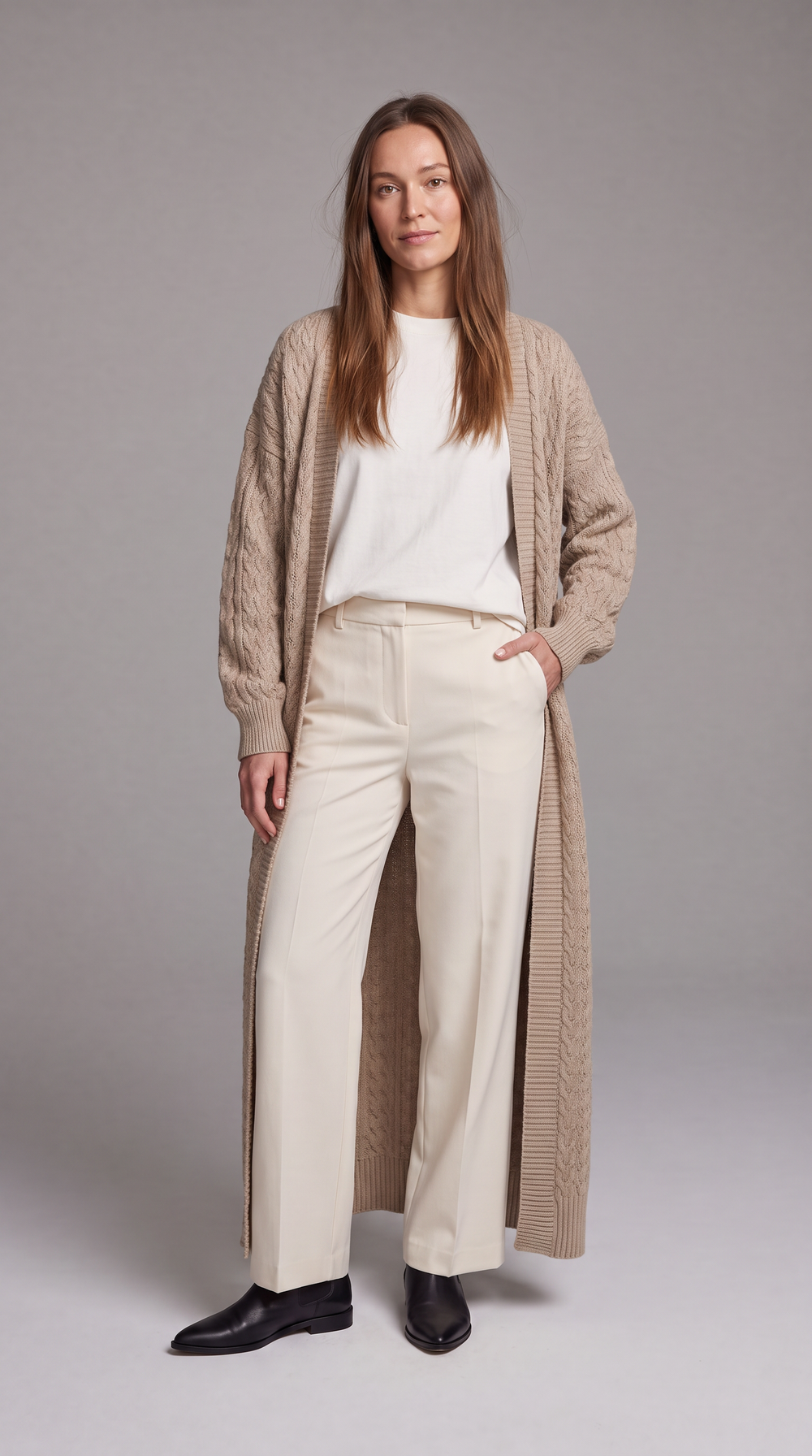 Women's longline textured knit cardigan shown in black and beige with open front and long sleeves