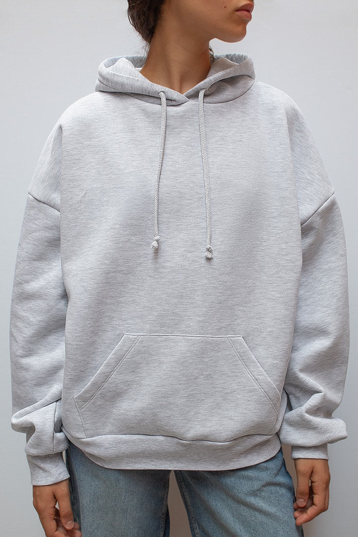 Grey hooded sweatshirt with sequin wings on the back