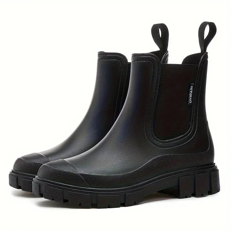 Women's slip-on Chelsea boots with elastic sides and lug soles