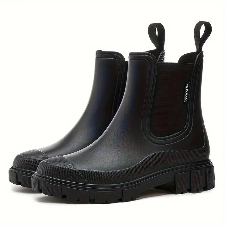 Women's slip-on Chelsea boots with elastic sides and lug soles