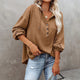 Women's loose V-neck button hoodie with drawcord hood and long sleeves