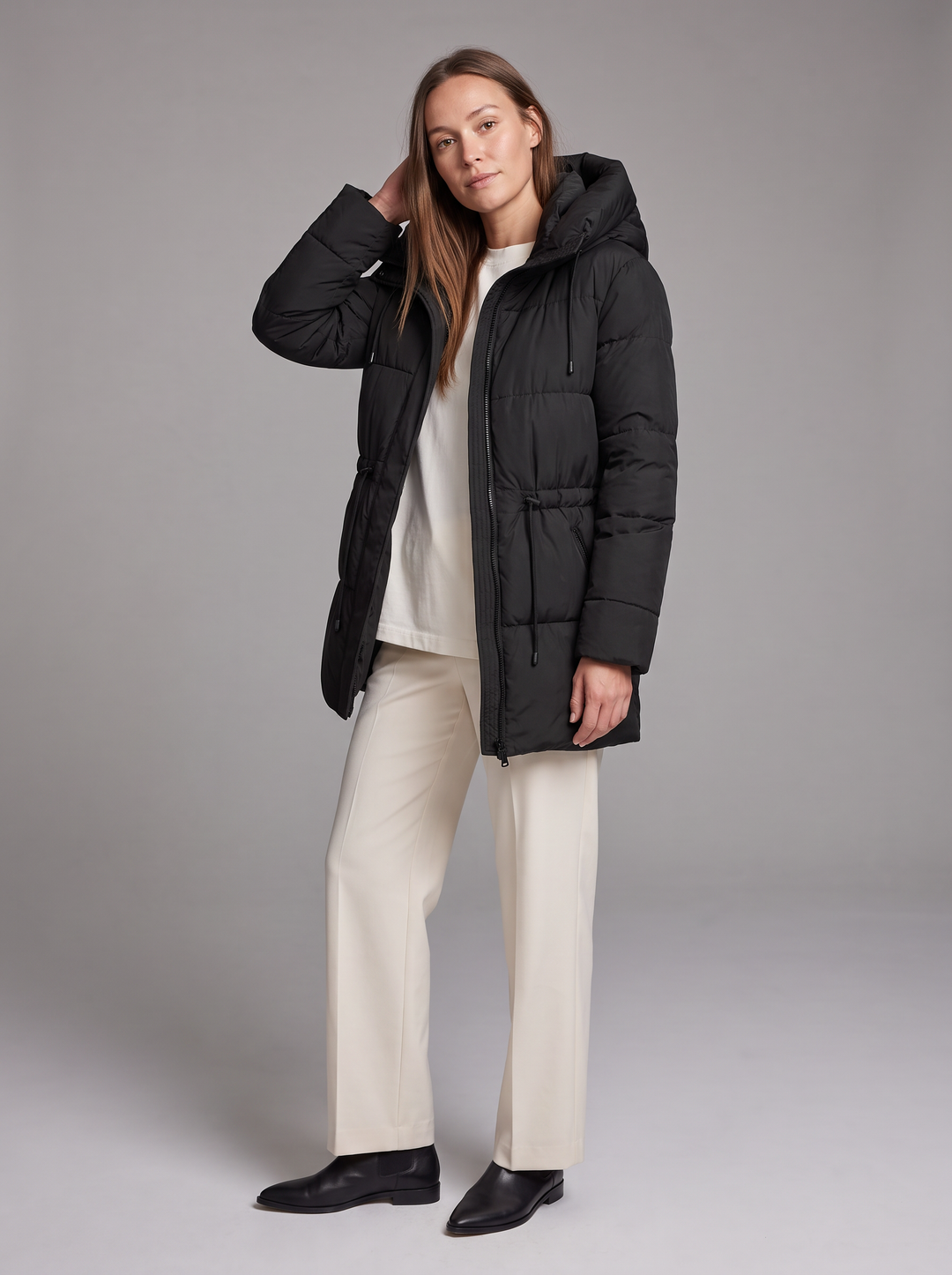 Women's padded hooded parka coat shown in beige and black
