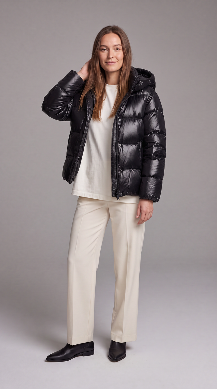 Women's hooded quilted puffer coat with long sleeves and zip front