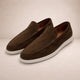 Men's casual slip-on loafers with moc toe stitching and flat white soles