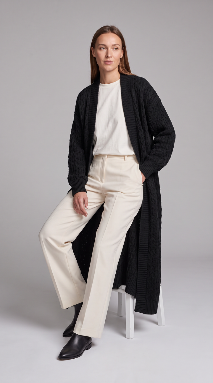 Women's longline textured knit cardigan shown in black and beige with open front and long sleeves