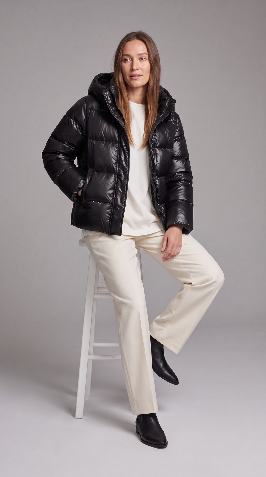 Women's hooded quilted puffer coat with long sleeves and zip front