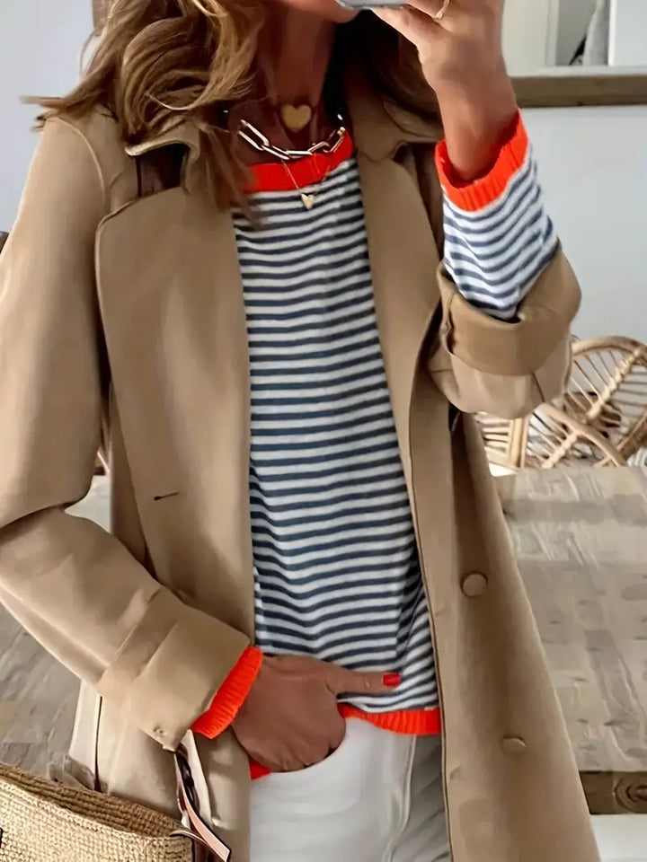 Women's striped turtleneck jumper with orange ribbed trim