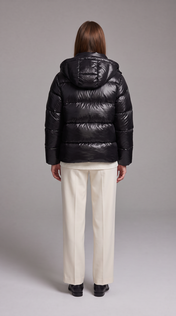Women's hooded quilted puffer coat with long sleeves and zip front