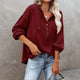 Women's loose V-neck button hoodie with drawcord hood and long sleeves