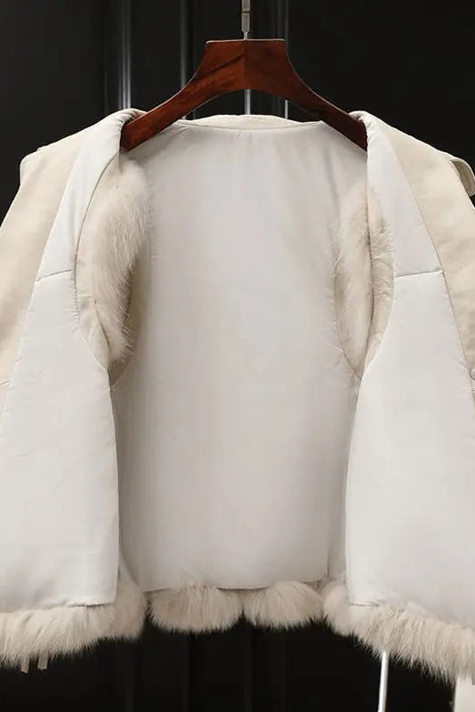 Women's sleeveless faux fur vest with lapel collar and front pockets