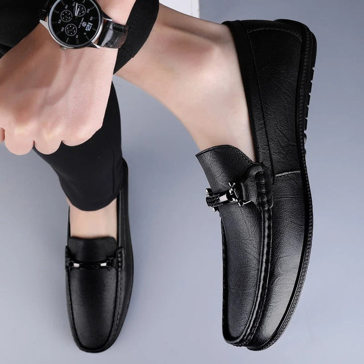 Men's slip-on loafers with moc toe and decorative vamp strap