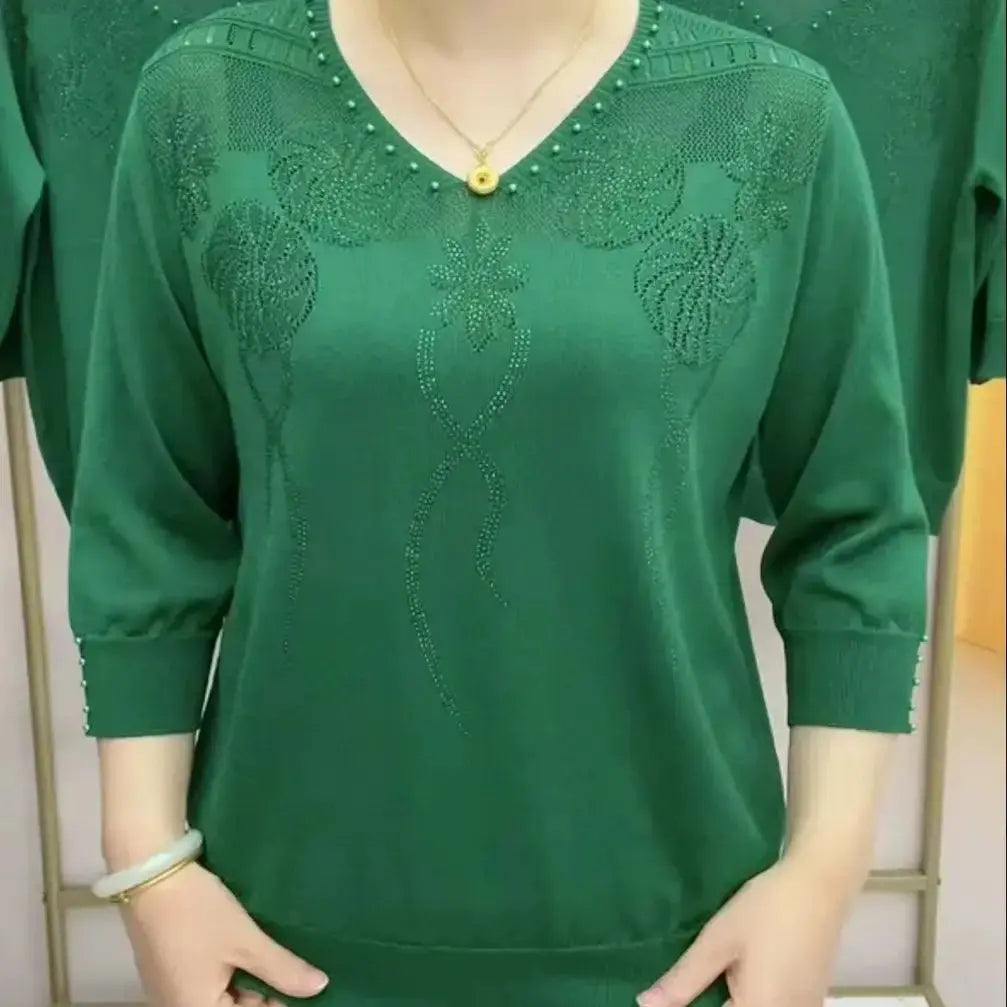 V-neck jersey top with floral embellishment and three-quarter sleeves