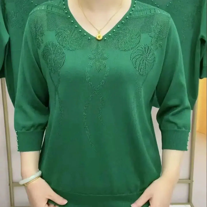 V-neck jersey top with floral embellishment and three-quarter sleeves