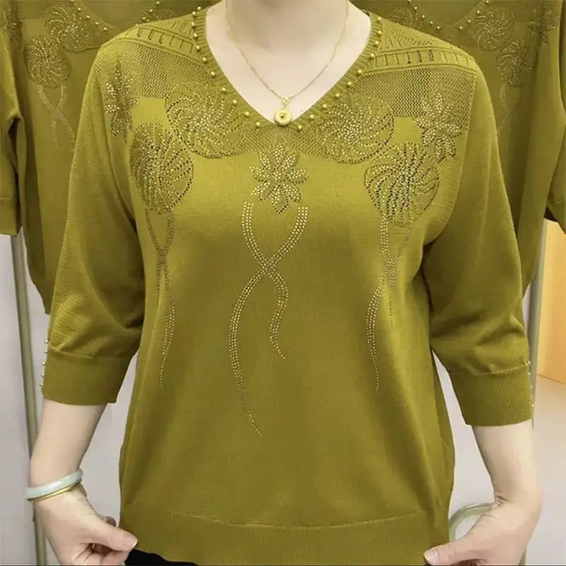 V-neck jersey top with floral embellishment and three-quarter sleeves