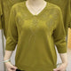 V-neck jersey top with floral embellishment and three-quarter sleeves