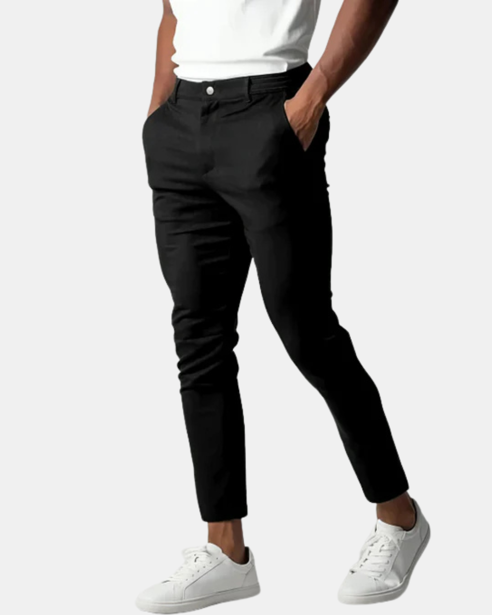 Men's slim tapered chino trousers shown in black and navy with button waist and ankle-length legs
