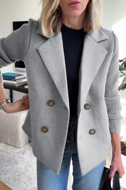 Women's structured blazer with notched lapels and ribbed long sleeves