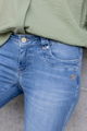 Women's blue slim fit jeans with low rise and cuffed hems