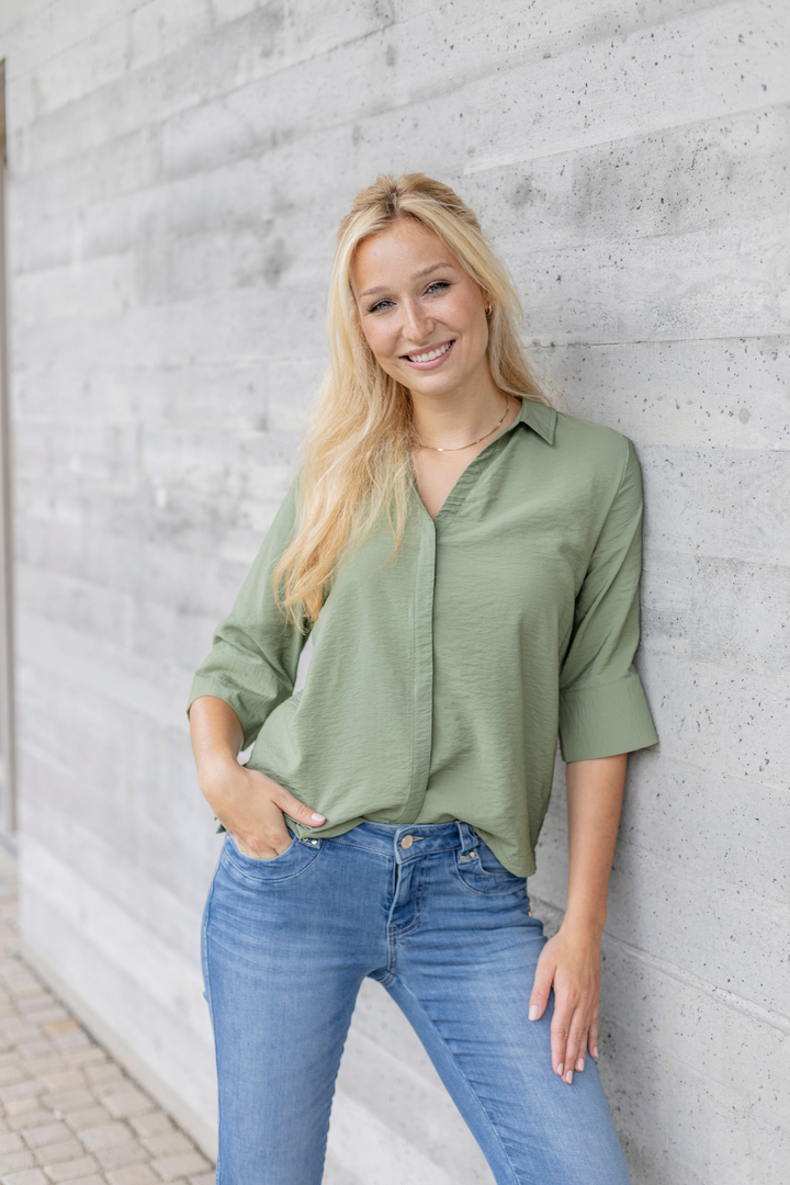 Women's blue slim fit jeans with low rise and cuffed hems