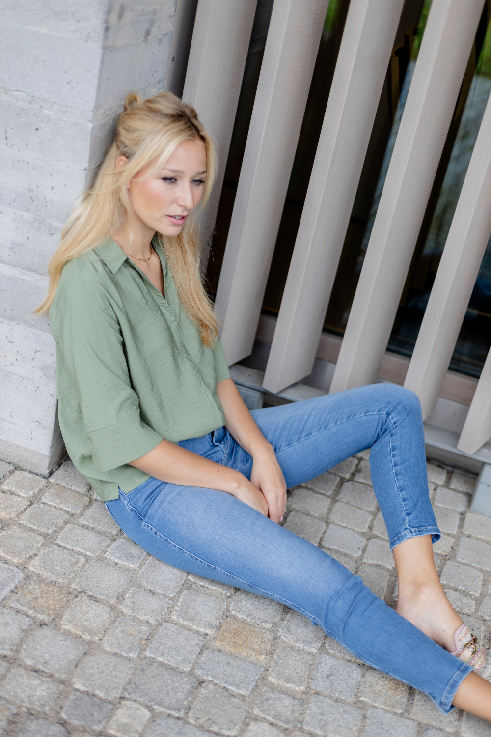 Women's blue slim fit jeans with low rise and cuffed hems