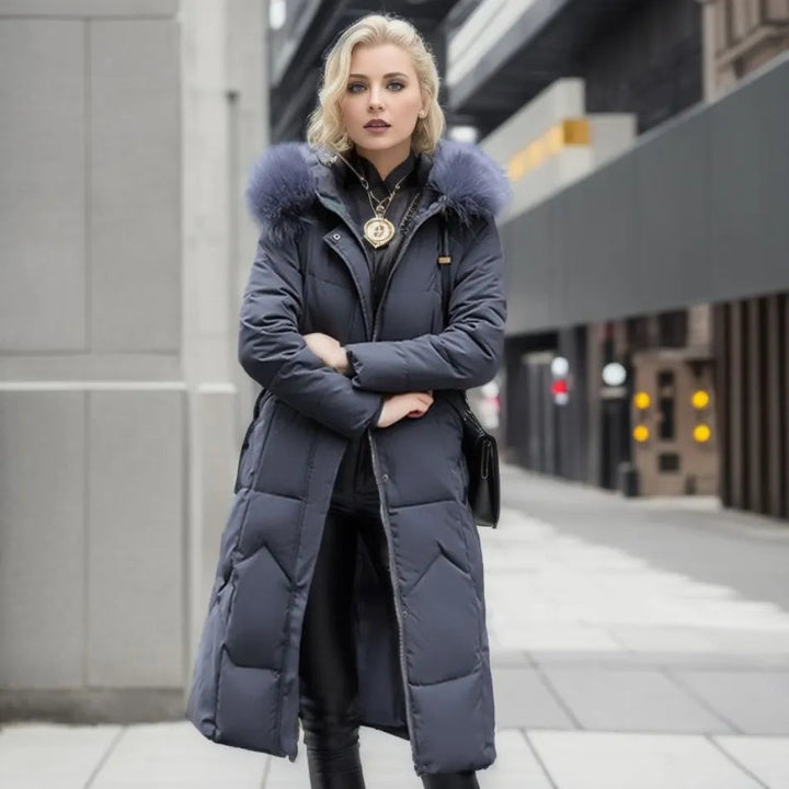 Women's long padded hooded coat with faux fur trim