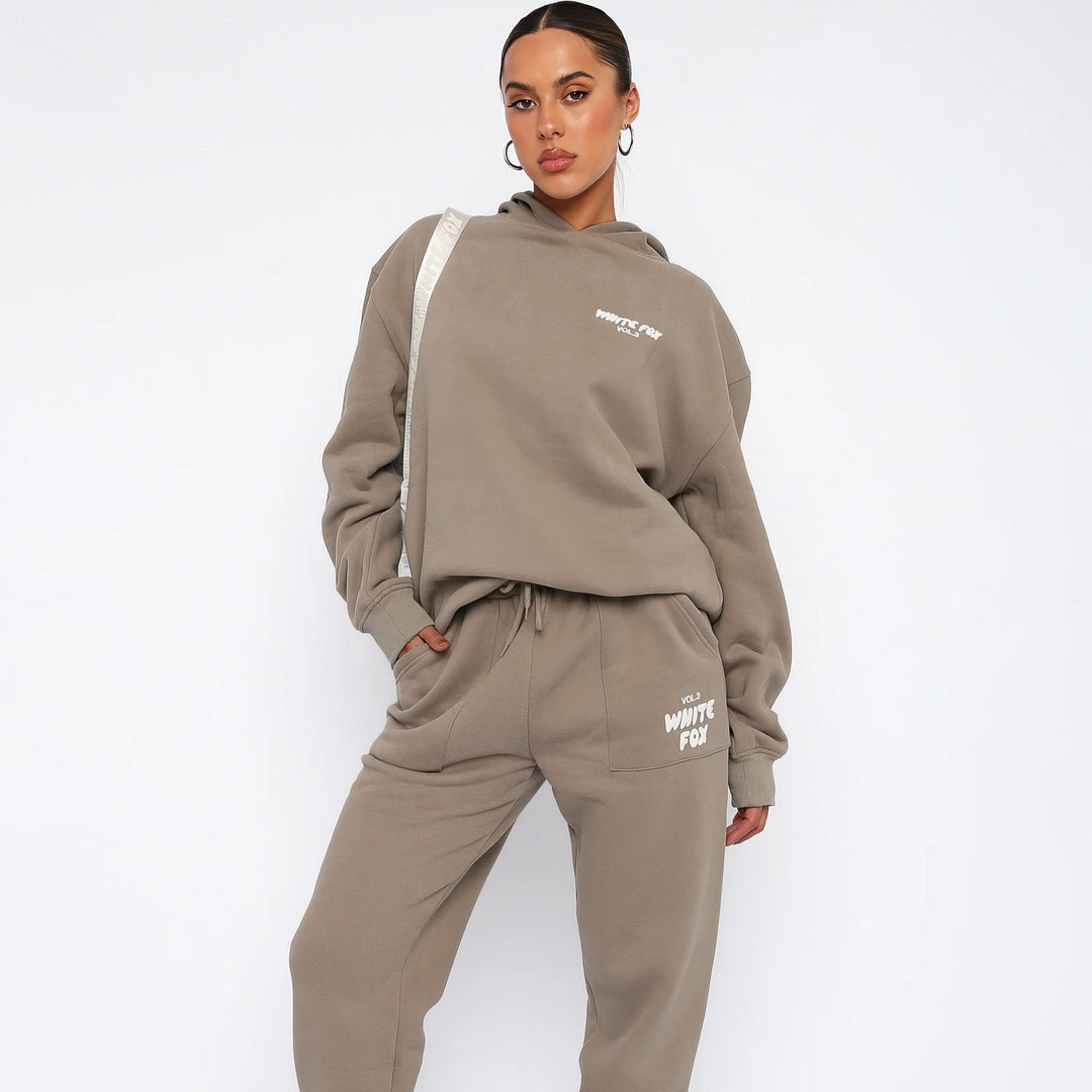 Women's hoodie and jogger tracksuit set with hood and pockets