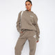 Women's hoodie and jogger tracksuit set with hood and pockets