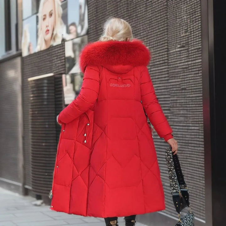 Women's long padded hooded coat with faux fur trim