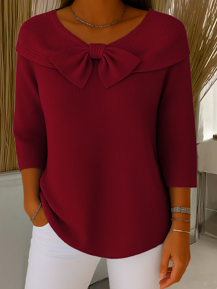 Women's ribbed sweater with round neck, 3/4 sleeves and centre bow detail