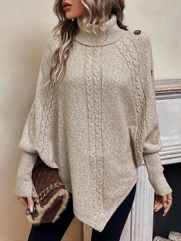 Women's cable knit poncho sweater with high neck, batwing sleeves and asymmetric hem