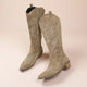 Women's tall cowboy boots with pointed toes, embroidered panels and low block heels