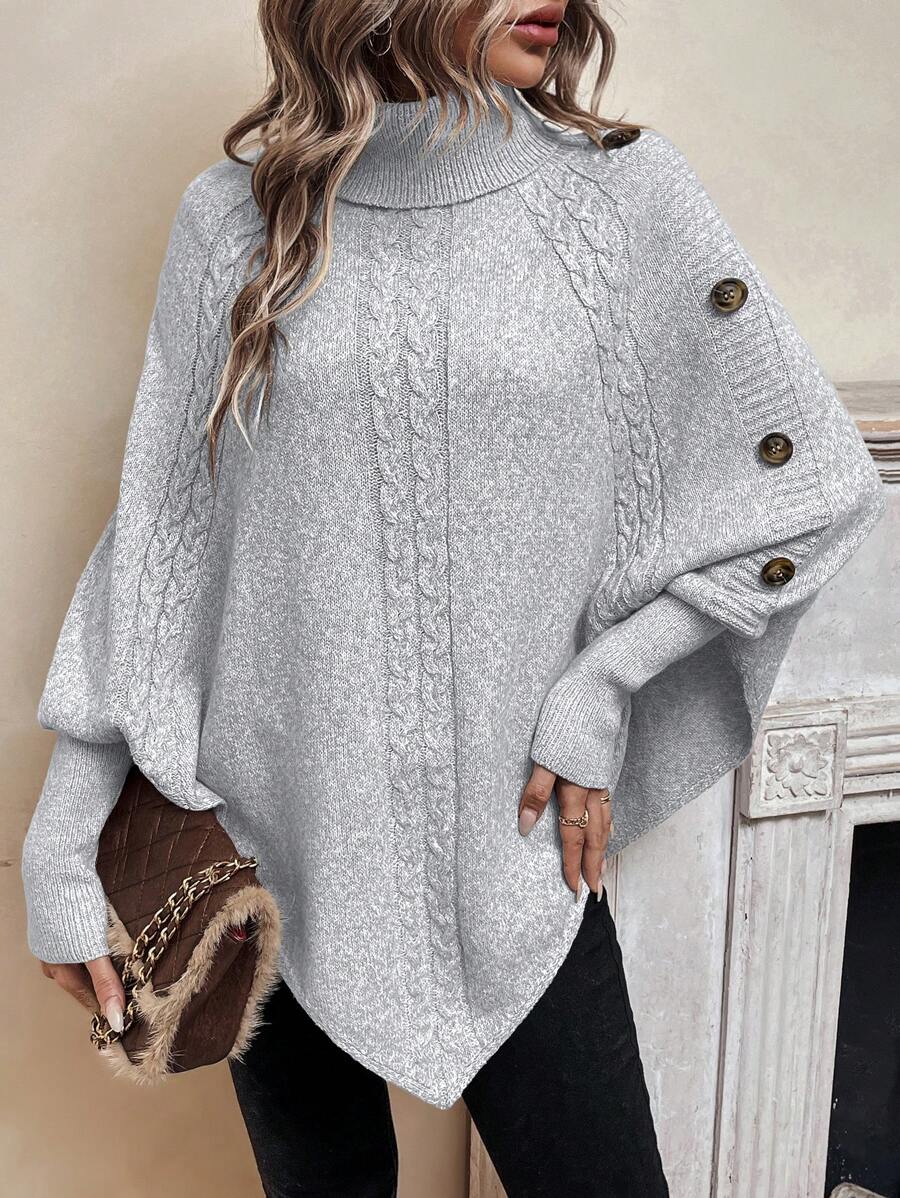 Women's cable knit poncho sweater with high neck, batwing sleeves and asymmetric hem
