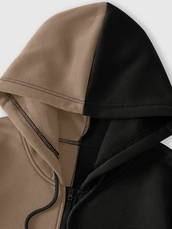 Two-tone men's zip-up hoodie with graphic face print and front pockets
