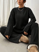 Women's knitted crew-neck sweater and matching trousers set