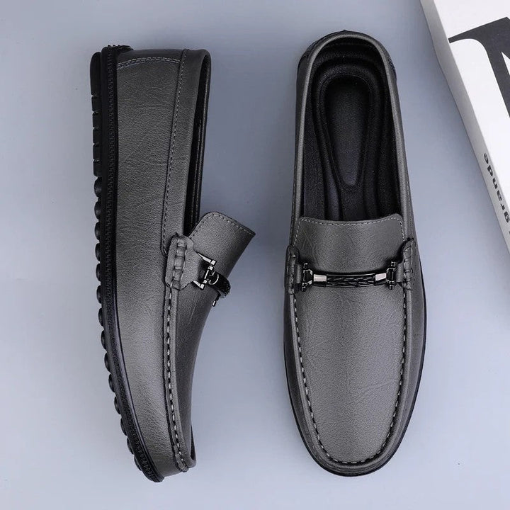 Men's slip-on loafers with moc toe and decorative vamp strap