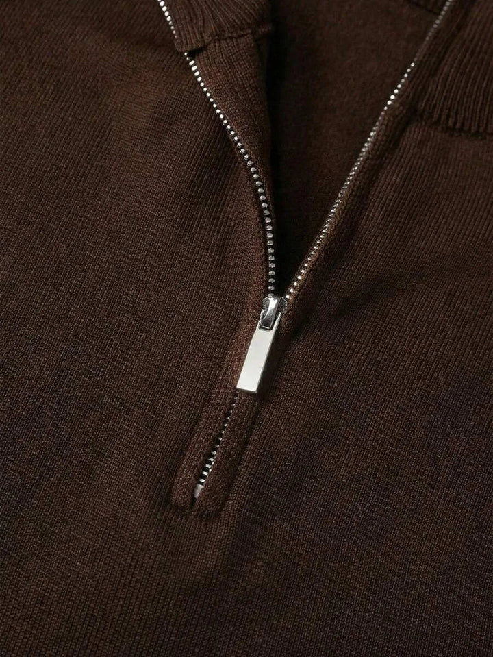 Men's short-sleeve knit polo shirt with raised collar and half-zip front