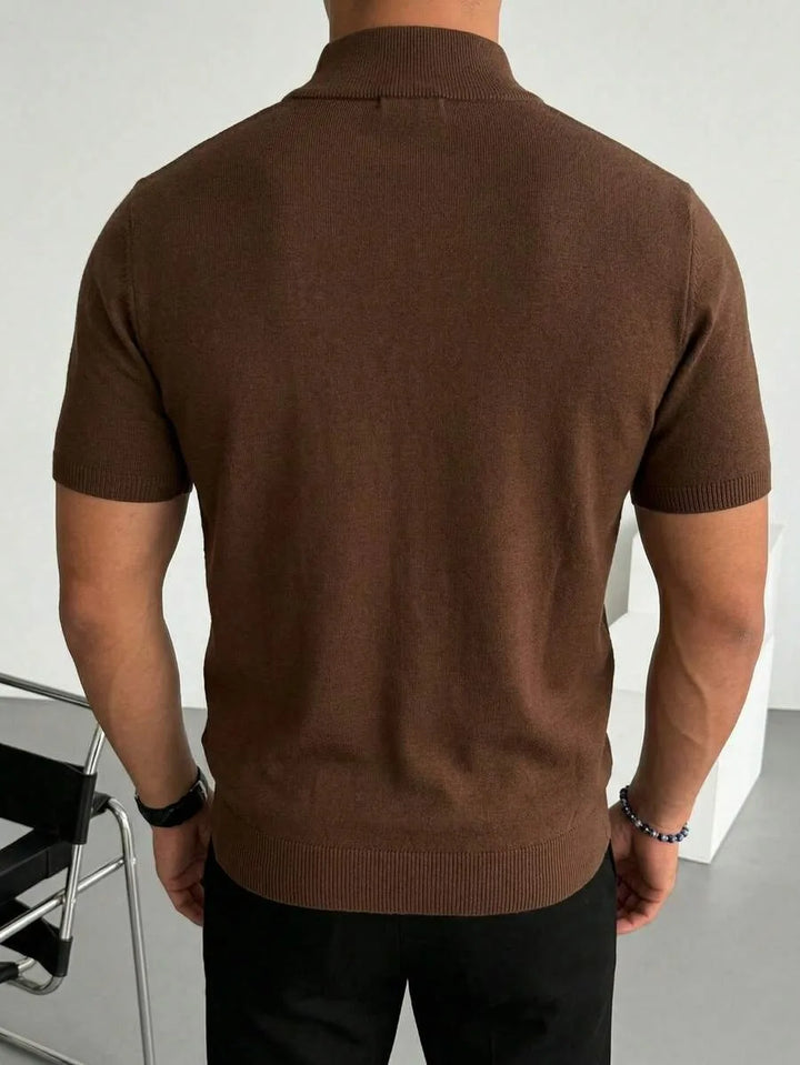 Men's short-sleeve knit polo shirt with raised collar and half-zip front