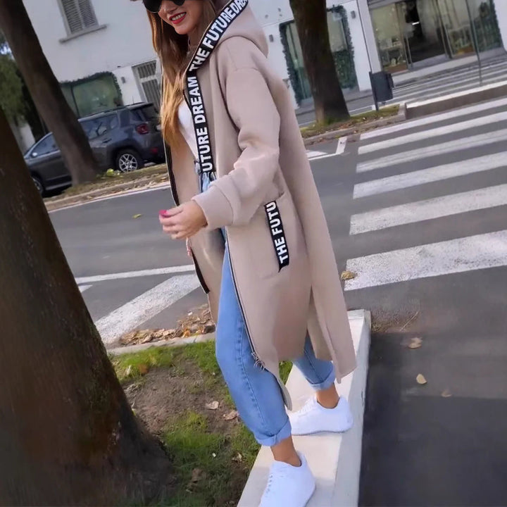 Women's long hooded coat with front zipper, patch pockets and contrasting trim
