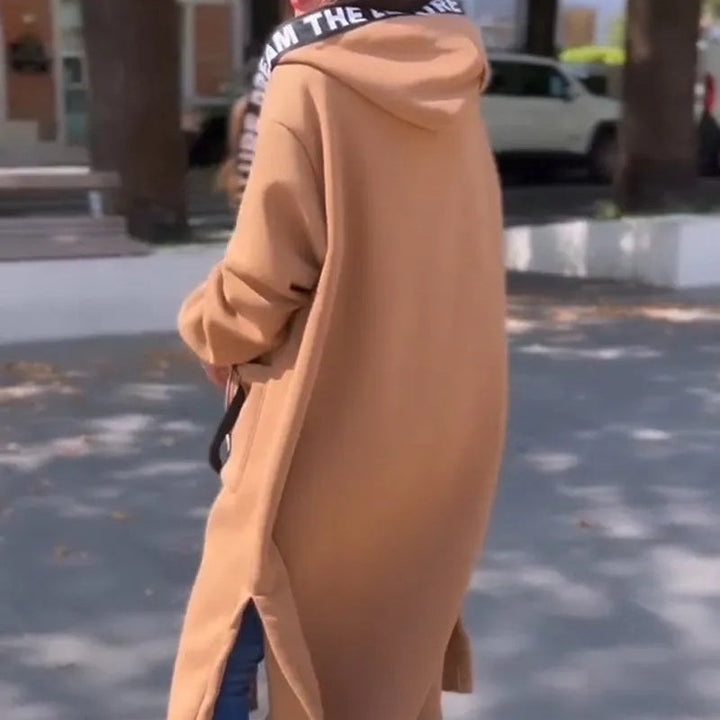 Women's long hooded coat with front zipper, patch pockets and contrasting trim