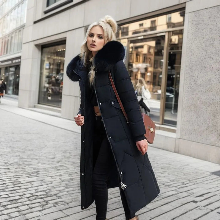 Women's long padded hooded coat with faux fur trim