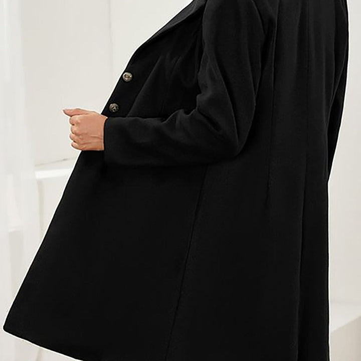 Women's long tailored coat with notched lapels and button front