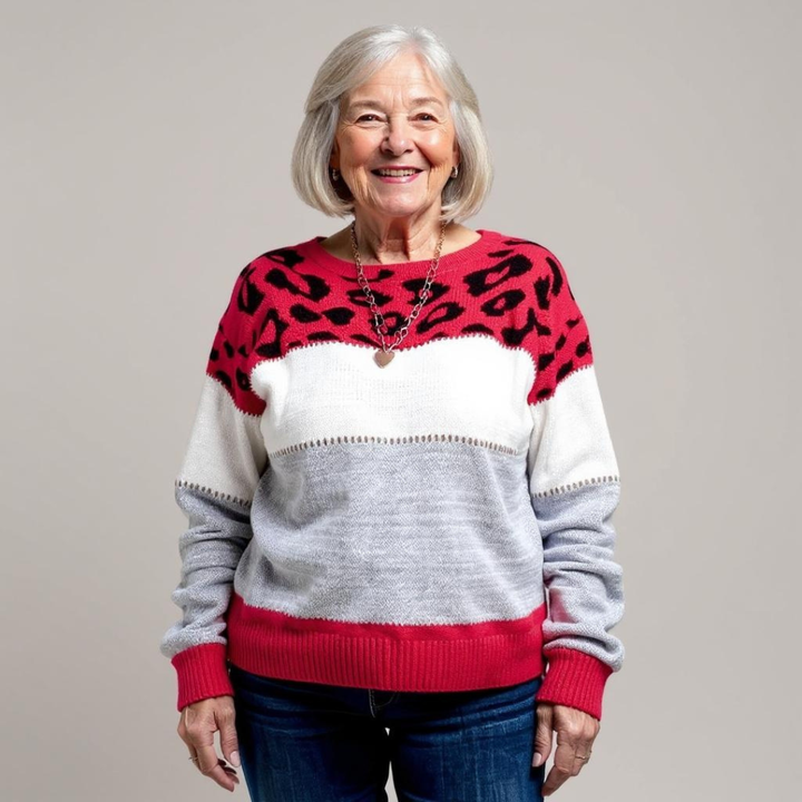 Women's leopard print color block sweater with crew neckline and long sleeves