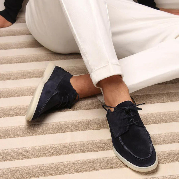 Men's lace-up moc toe loafers shown in navy and beige colourways