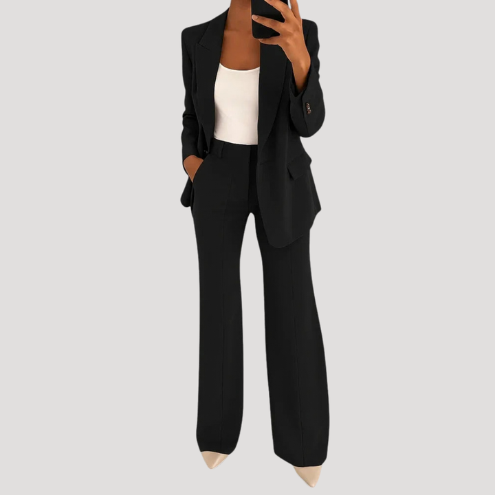 Women's tailored two-piece suit with notched-lapel blazer and straight-leg trousers