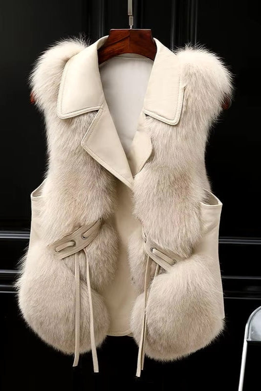 Women's sleeveless faux fur vest with lapel collar and front pockets