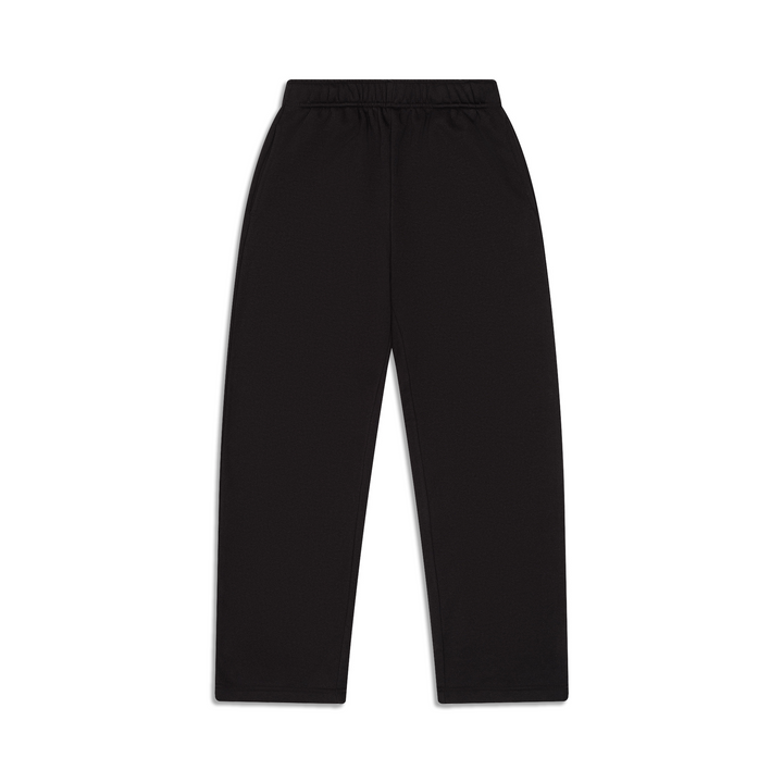 Man wearing black wide-leg sweatpants with an elastic waistband and side pockets